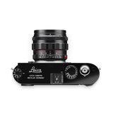 M11, glossy black paint finish